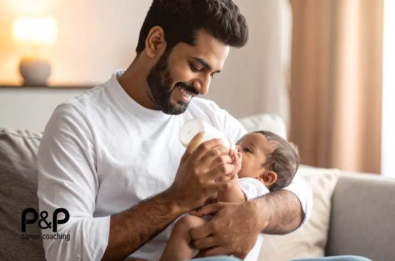 Man feeding a baby with a bottle