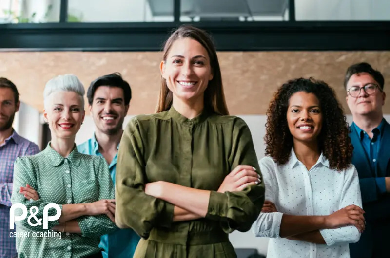 Diverse group of employees and leaders representing an inclusive, family-friendly workplace, supported by Parent & Professional career coaching through key career and life transitions.